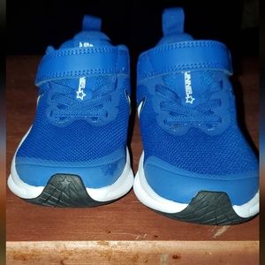 Size 11 kids blue and white Nike Star runners